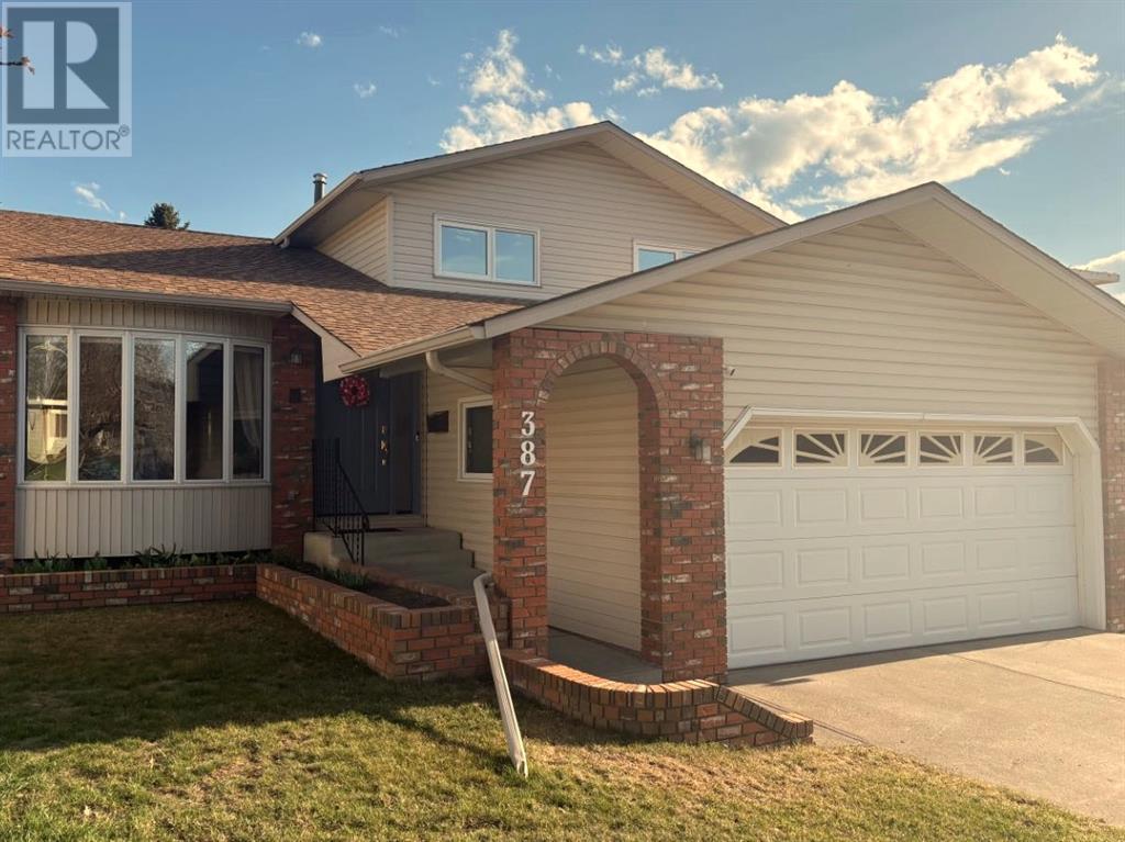 Property at 387 Silvergrove Drive NW image 1