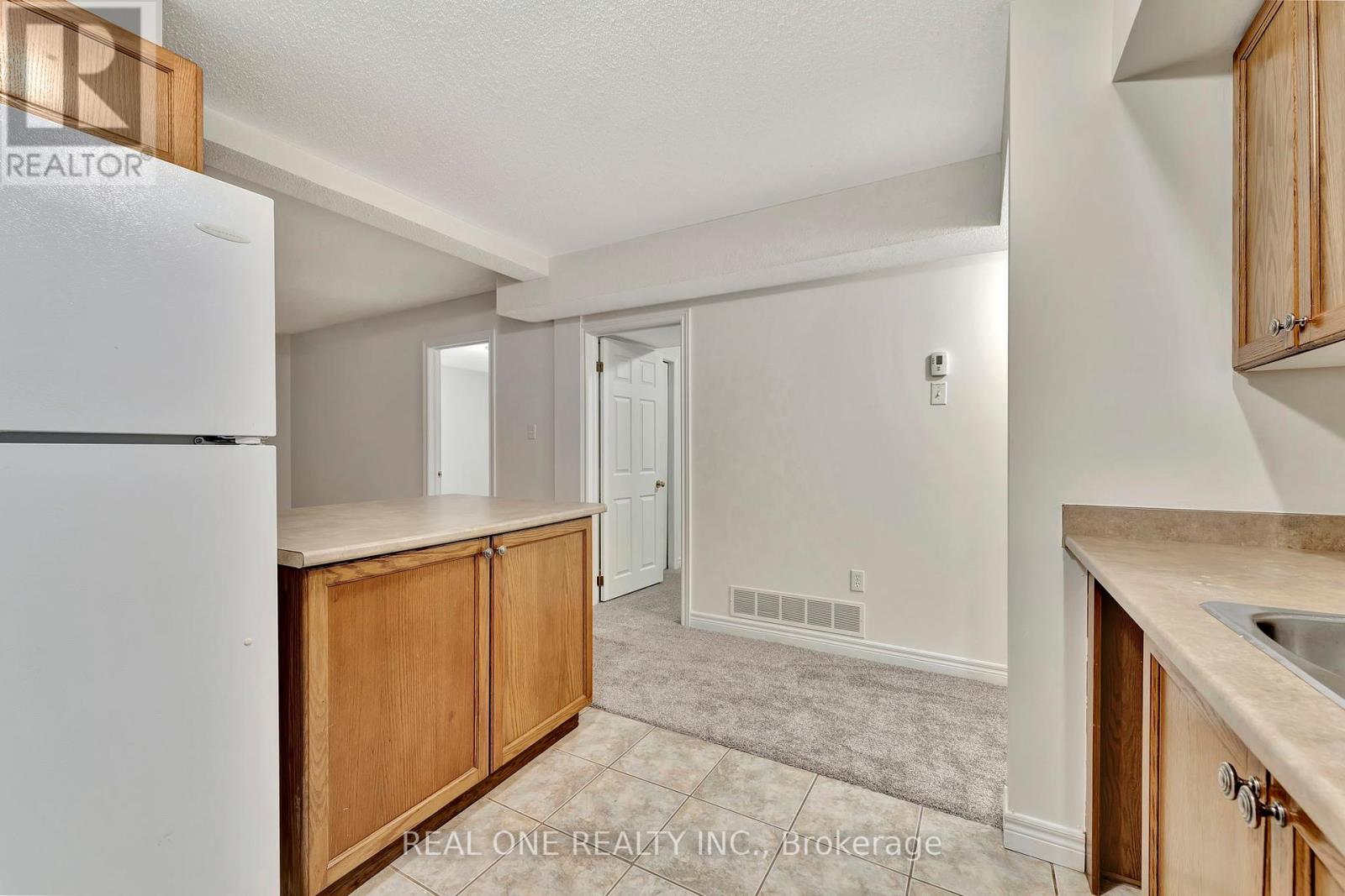 Basement - 303 Colton Circle, Kitchener, Ontario  N2A 4K5 - Photo 6 - X12143263