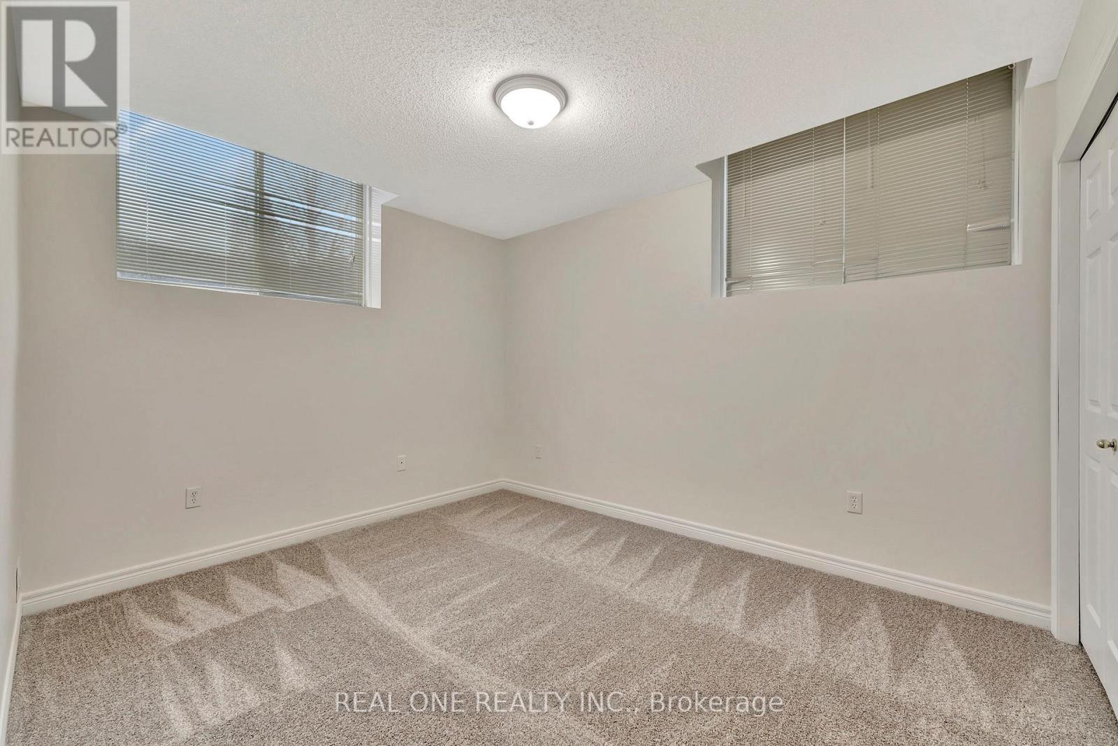 Basement - 303 Colton Circle, Kitchener, Ontario  N2A 4K5 - Photo 7 - X12143263