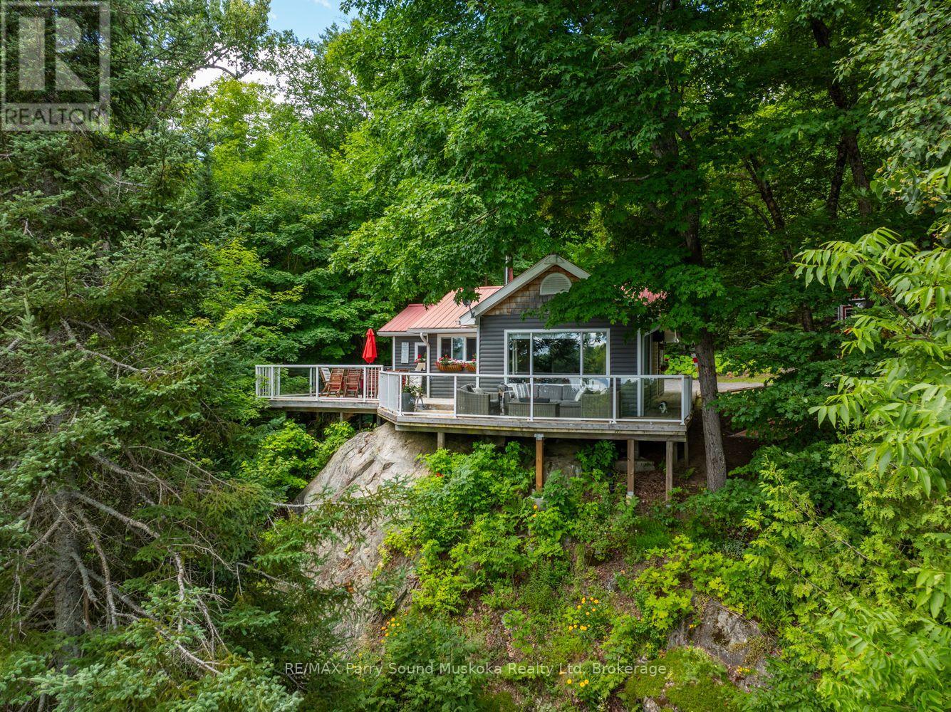 74 Captain Estates Rd, Whitestone, Ontario  P0A 1G0 - Photo 6 - X12143400