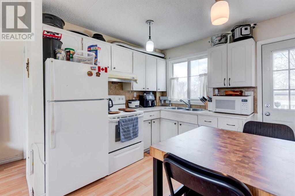 Property at 1107 52A Street SE image 4