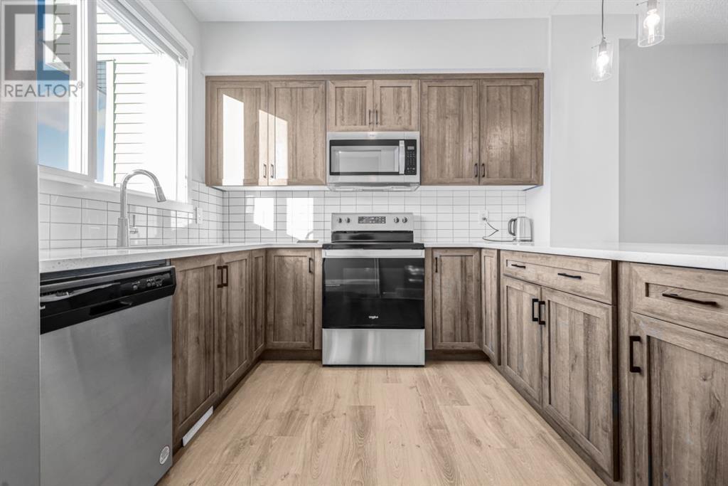157 Belmont Drive Sw, Calgary, Alberta  T0L 0X0 - Photo 10 - A2202255