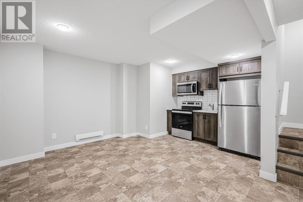 157 Belmont Drive Sw, Calgary, Alberta  T0L 0X0 - Photo 29 - A2202255