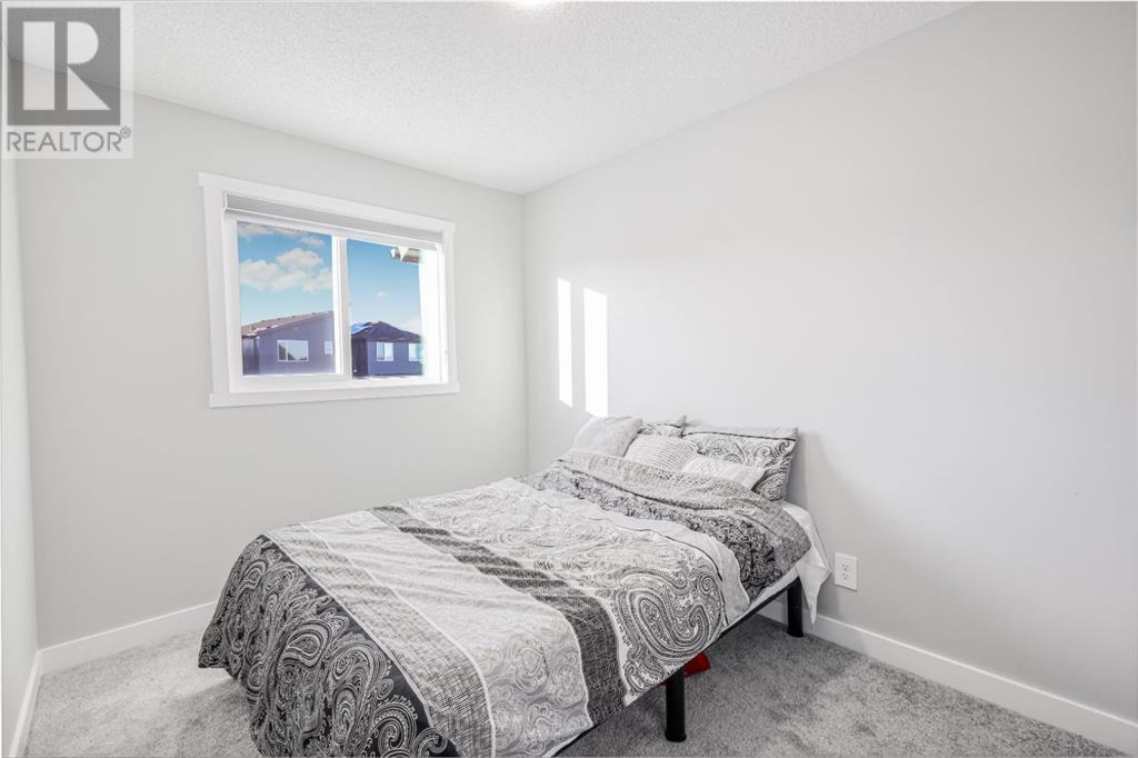 157 Belmont Drive Sw, Calgary, Alberta  T0L 0X0 - Photo 25 - A2202255
