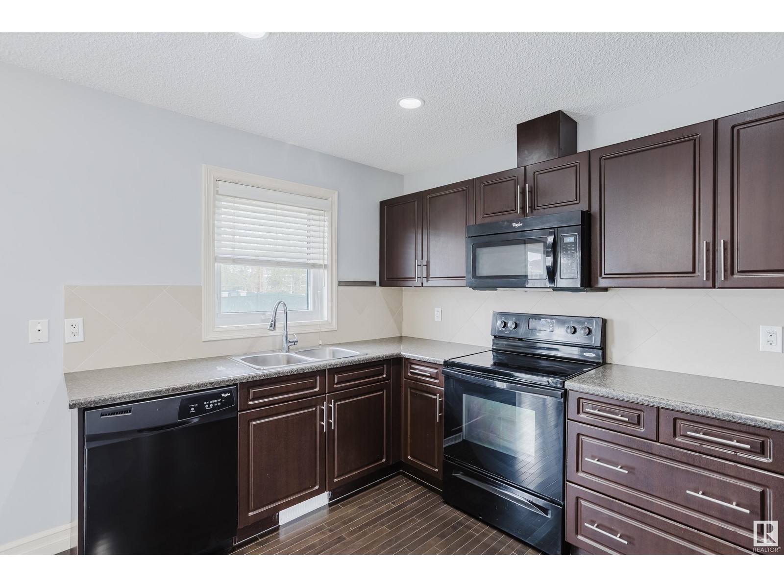 Property at #107 219 CHARLOTTE WY image 2