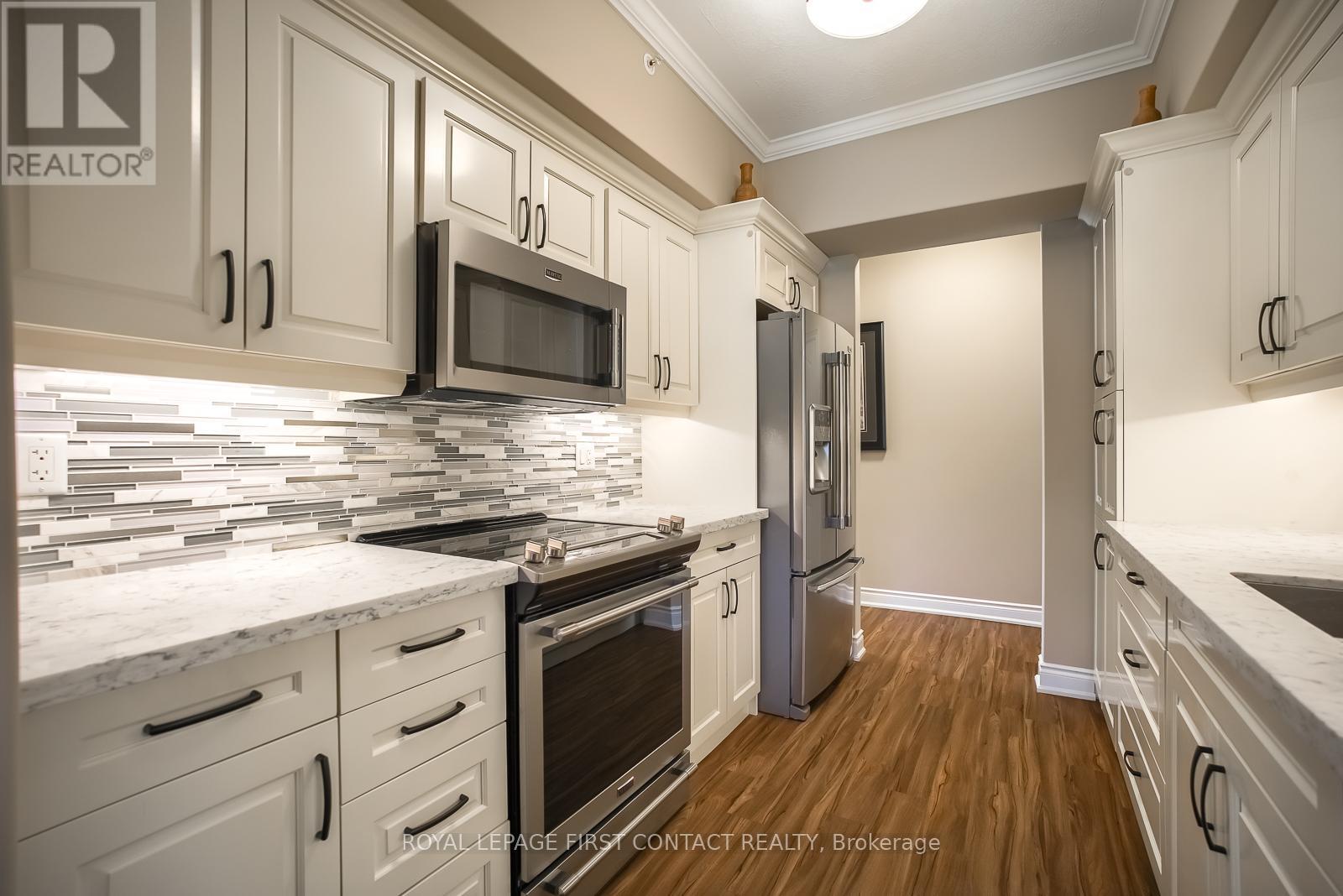 101 - 720 Yonge Street, Barrie (Painswick South), Ontario  L9G 0G9 - Photo 6 - S12145184
