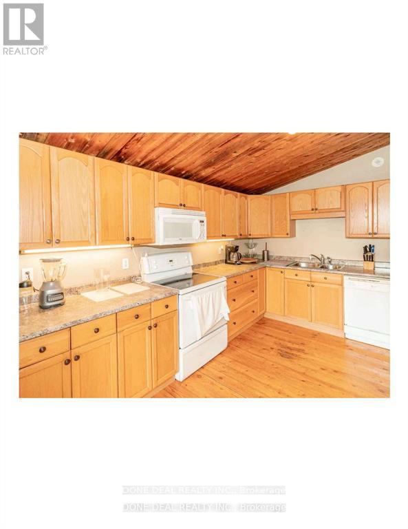 179 Chapman Drive, Magnetawan, Ontario  P0A 1C0 - Photo 8 - X12145093