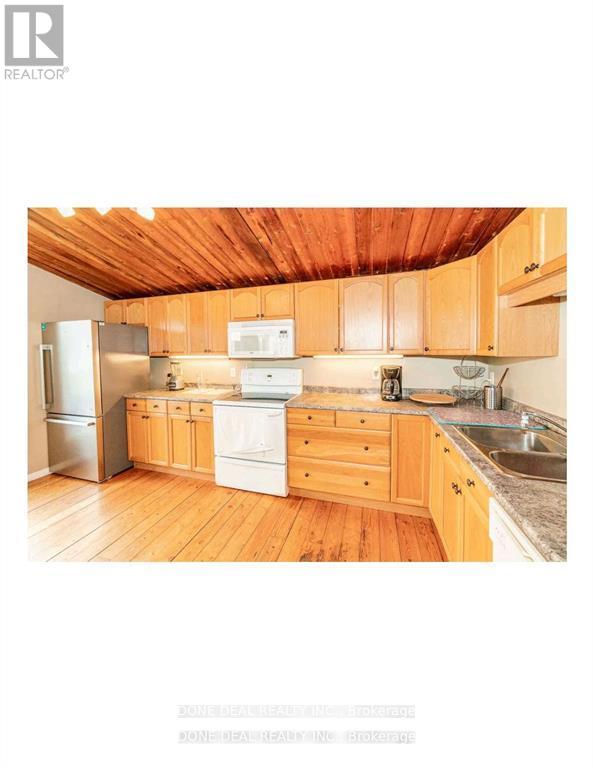 179 Chapman Drive, Magnetawan, Ontario  P0A 1C0 - Photo 9 - X12145093