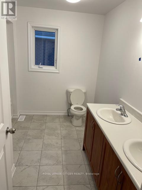 74 Brennan Crescent, Loyalist, Ontario  K0H 2H0 - Photo 7 - X12145260