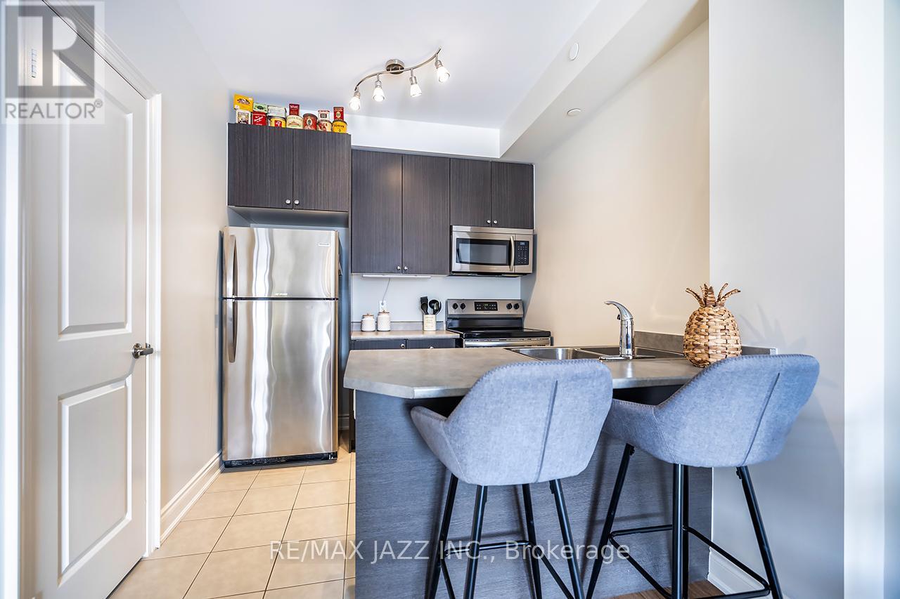 203 - 80 Aspen Springs Drive, Clarington, Ontario  L1C 0V4 - Photo 6 - E12145445