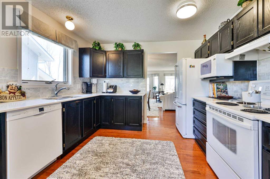 105 Arbour Cliff Close Nw, Calgary, Alberta  T3G 3W6 - Photo 9 - A2215027