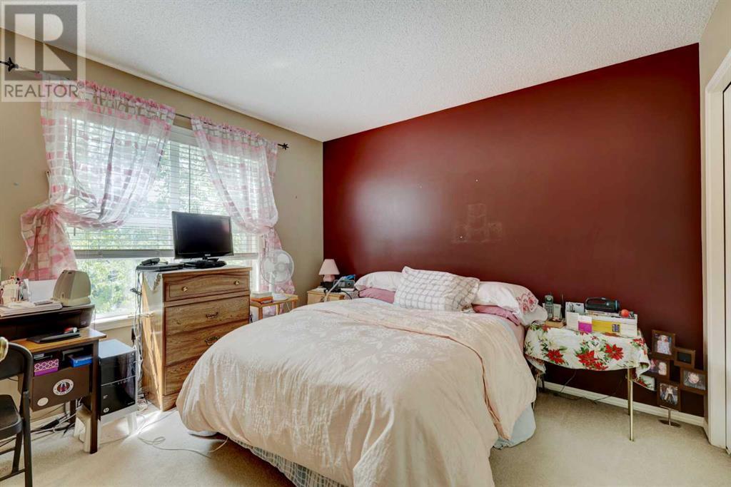 8, 200 Hidden Hills Terrace Nw, Calgary, Alberta  T3A 6E3 - Photo 12 - A2220179