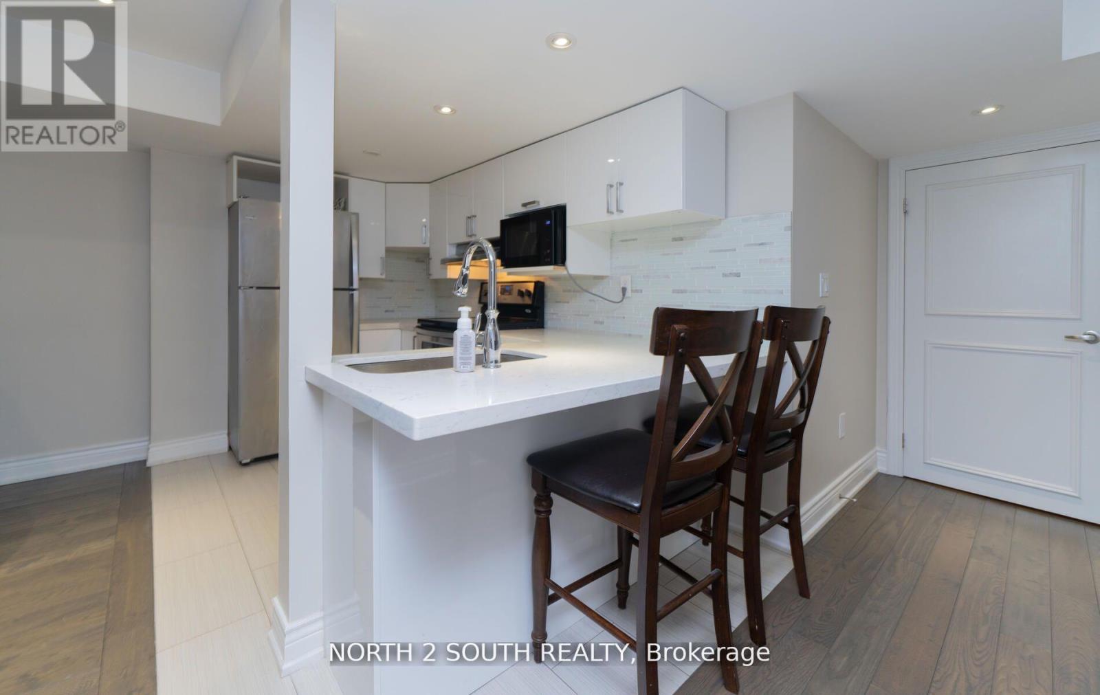 Bsmt - 11 Wingstem Court, Toronto, Ontario  M3H 5E4 - Photo 2 - C12145627