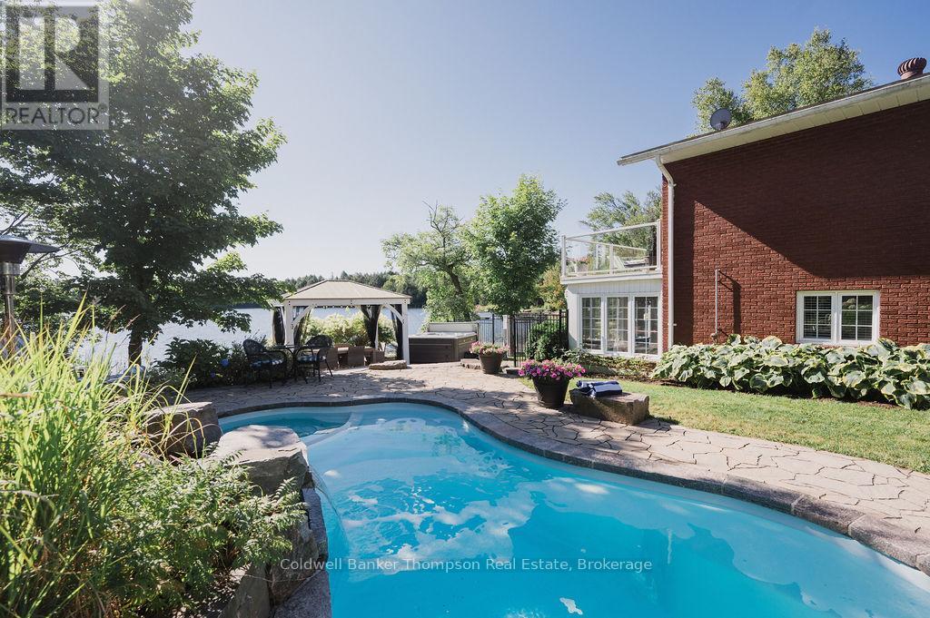 83 Scarlett Road, Machar, Ontario  P0A 1X0 - Photo 1 - X12145935