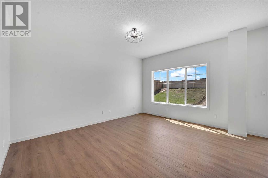 925 Bayview Heights Sw, Airdrie, Alberta  T4B 5M6 - Photo 15 - A2220327