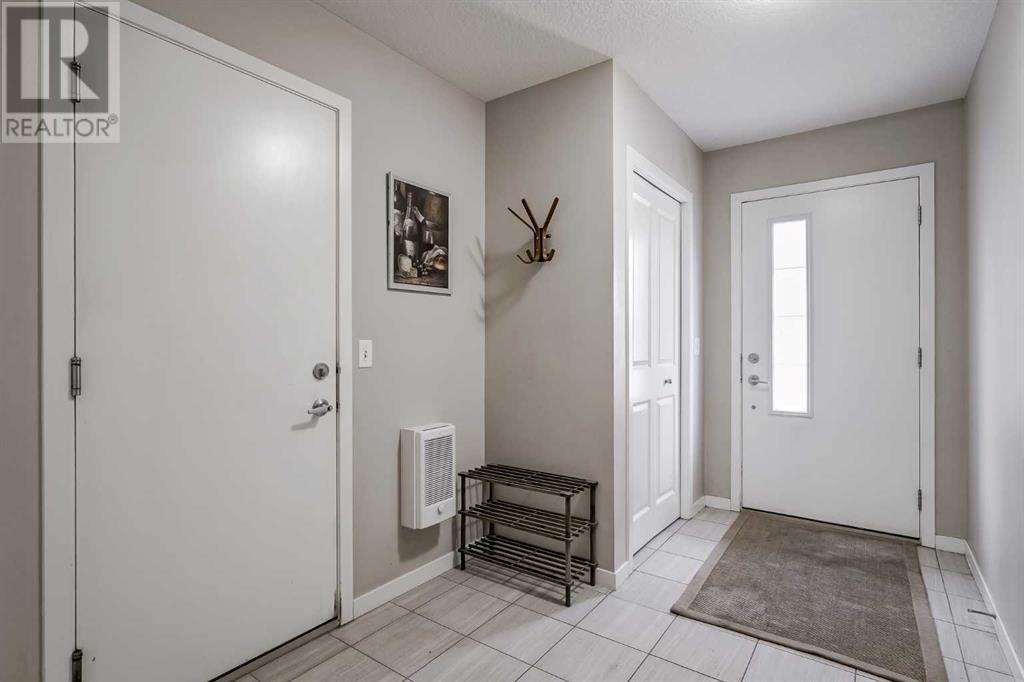 166 Copperpond Villas Se, Calgary, Alberta  T2Z 5B8 - Photo 6 - A2214489