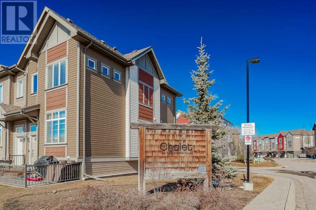 166 Copperpond Villas Se, Calgary, Alberta  T2Z 5B8 - Photo 1 - A2214489