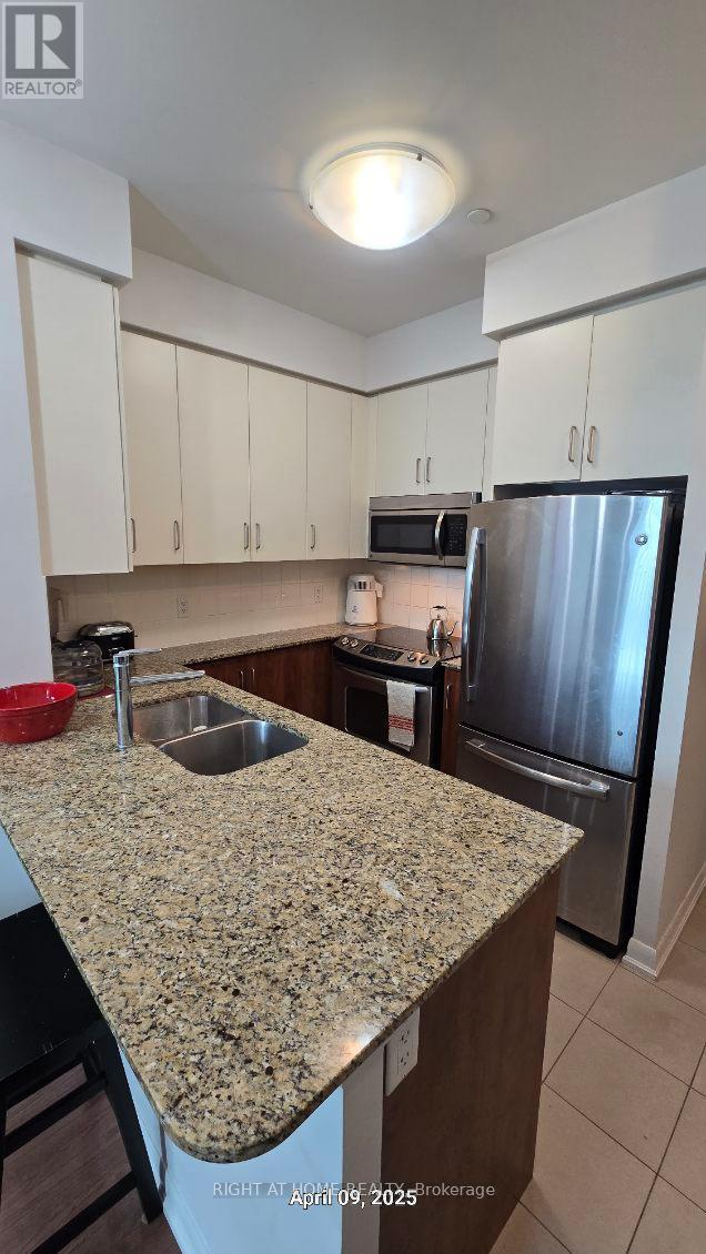 101 - 215 Sherway Gardens Road, Toronto, Ontario  M9C 0A4 - Photo 5 - W12076501
