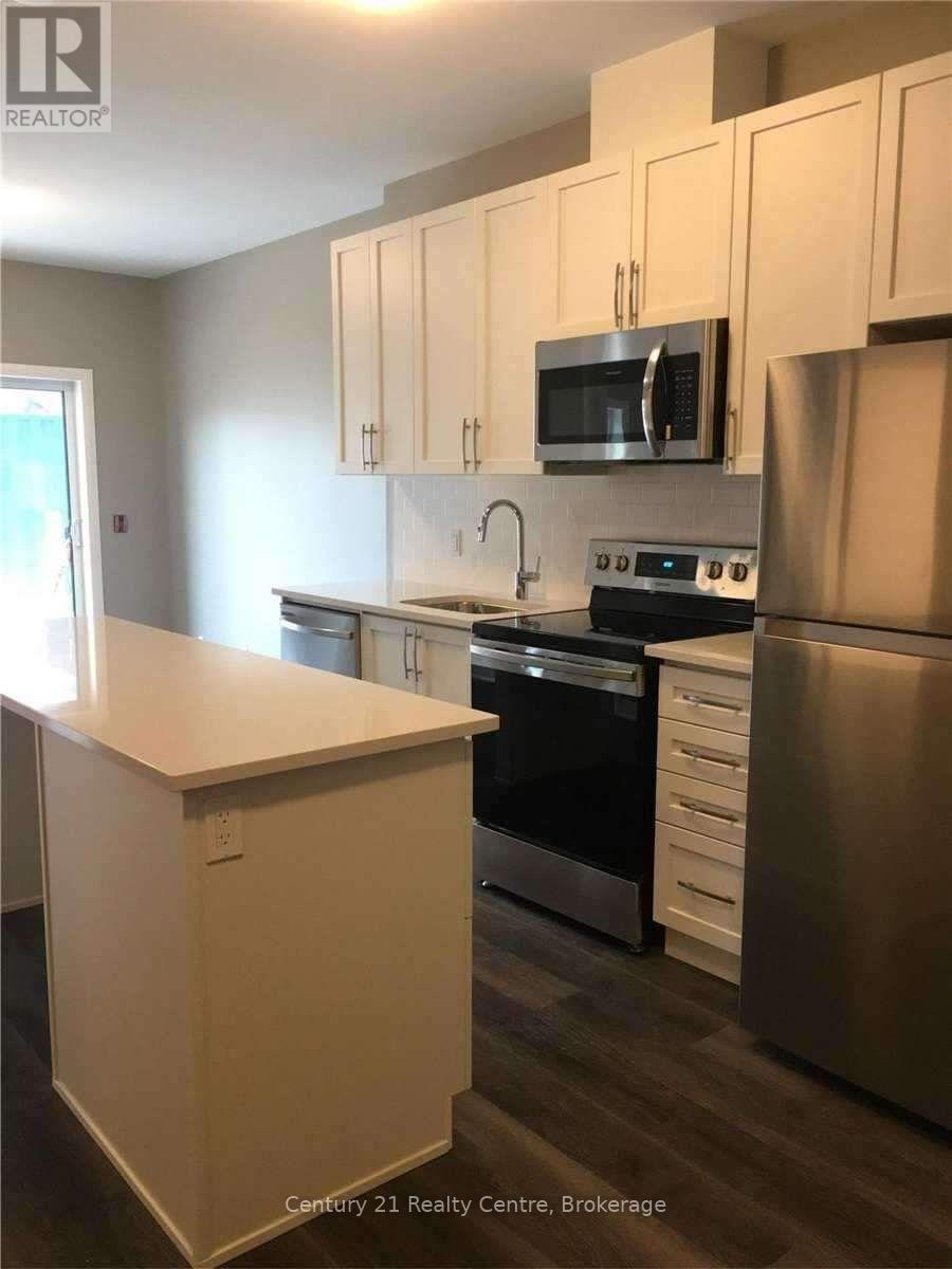 134 - 102 Grovewood Common, Oakville, Ontario  L6H 0X2 - Photo 4 - W12146227