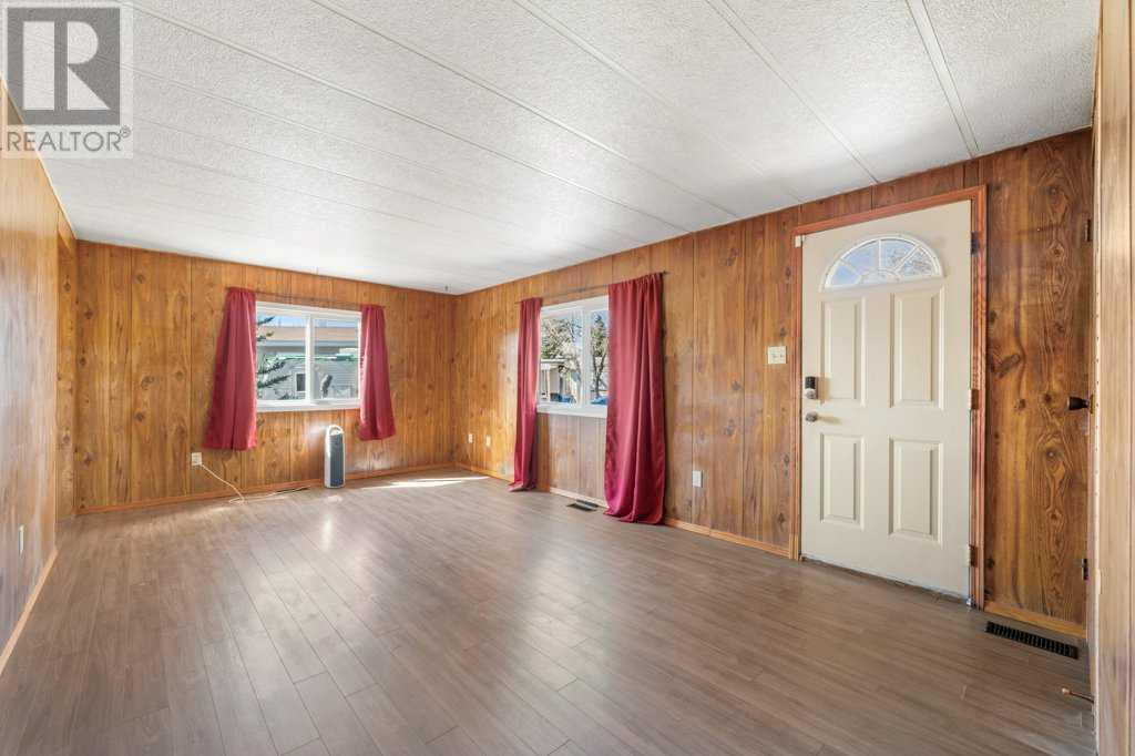 115 Huntwell Court Ne, Calgary, Alberta  T2K 5V1 - Photo 2 - A2220269