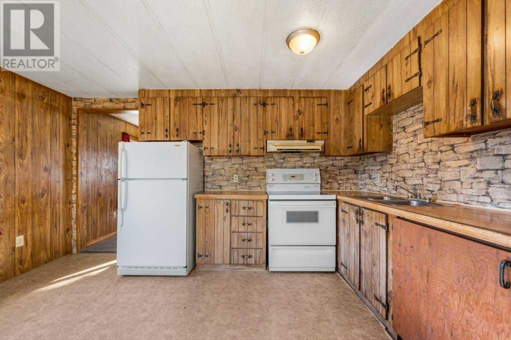 115 Huntwell Court Ne, Calgary, Alberta  T2K 5V1 - Photo 7 - A2220269