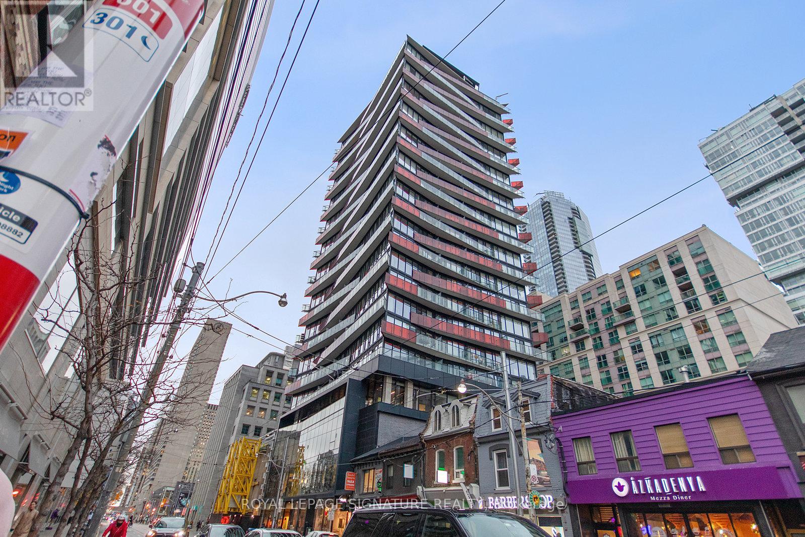 711 - 215 Queen Street W, Toronto, Ontario  M5V 0P5 - Photo 1 - C12146883