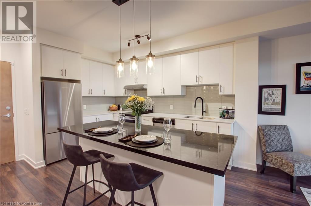Property at 320 PLAINS Road E Unit# 414 image 4