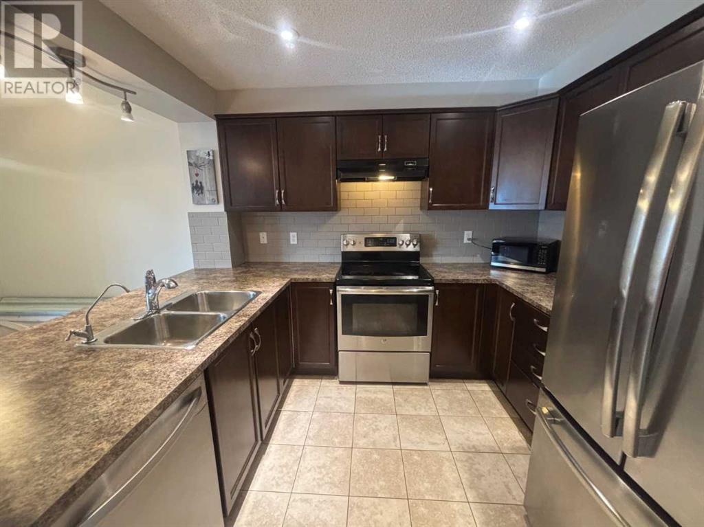 3136 Windsong Boulevard Sw, Airdrie, Alberta  T4B 3R3 - Photo 10 - A2214333