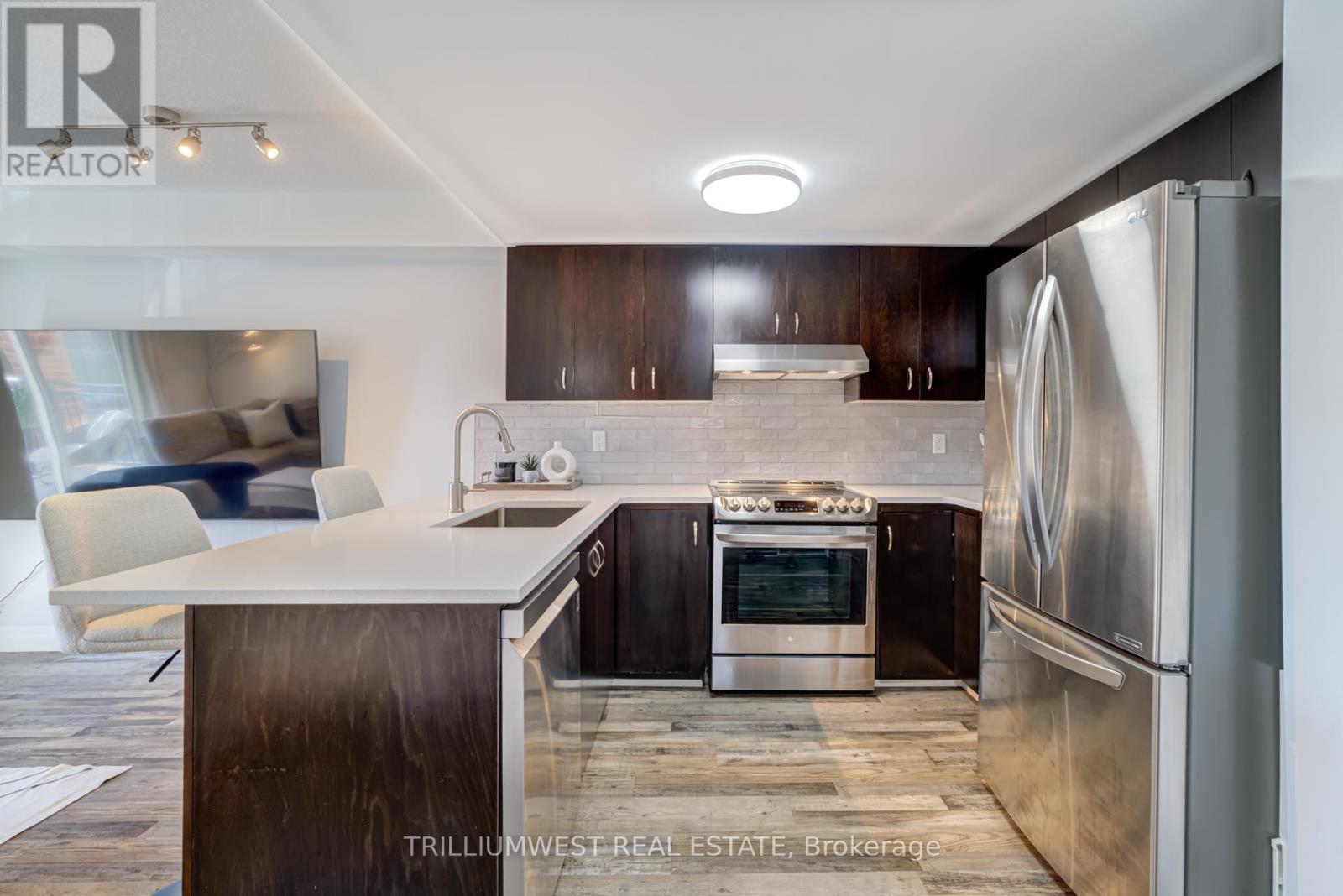 201 - 43 Goodwin Drive, Guelph, Ontario  N1L 0E8 - Photo 6 - X12147196