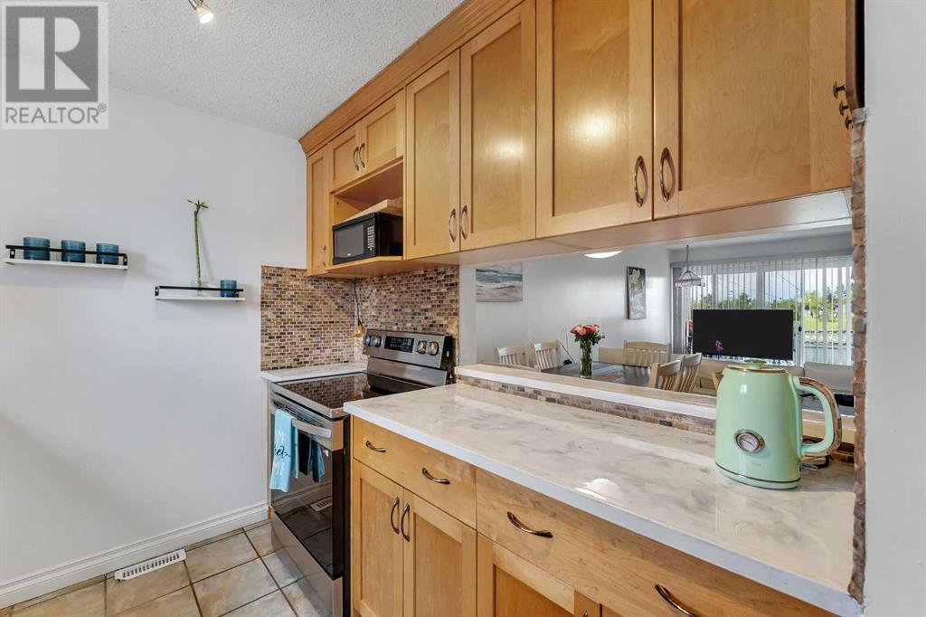 30, 131 Templehill Drive Ne, Calgary, Alberta  T1Y 4T1 - Photo 8 - A2219027