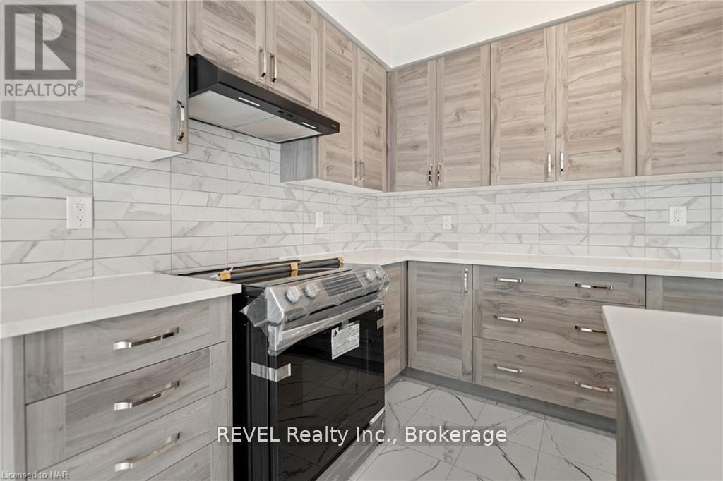 71 Sun Haven Lane, Thorold, Ontario  L2V 0K7 - Photo 14 - X12148385