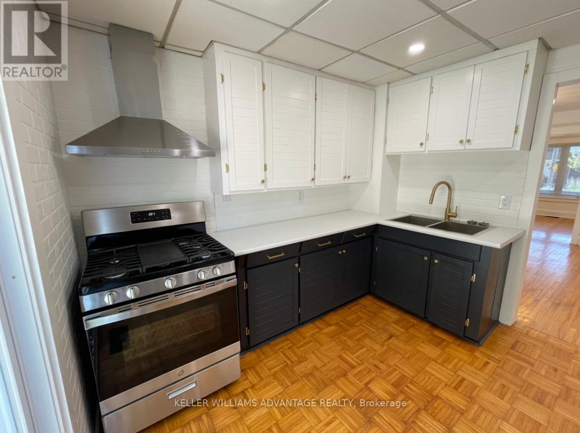 31 Hiltz Avenue, Toronto, Ontario  M4L 2N6 - Photo 4 - E12148162