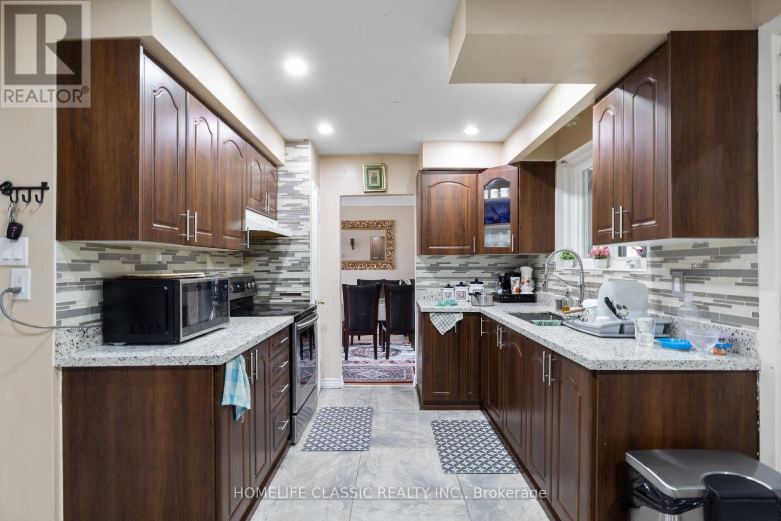 83 John Garland Boulevard, Toronto, Ontario  M9V 1N5 - Photo 7 - W12148234