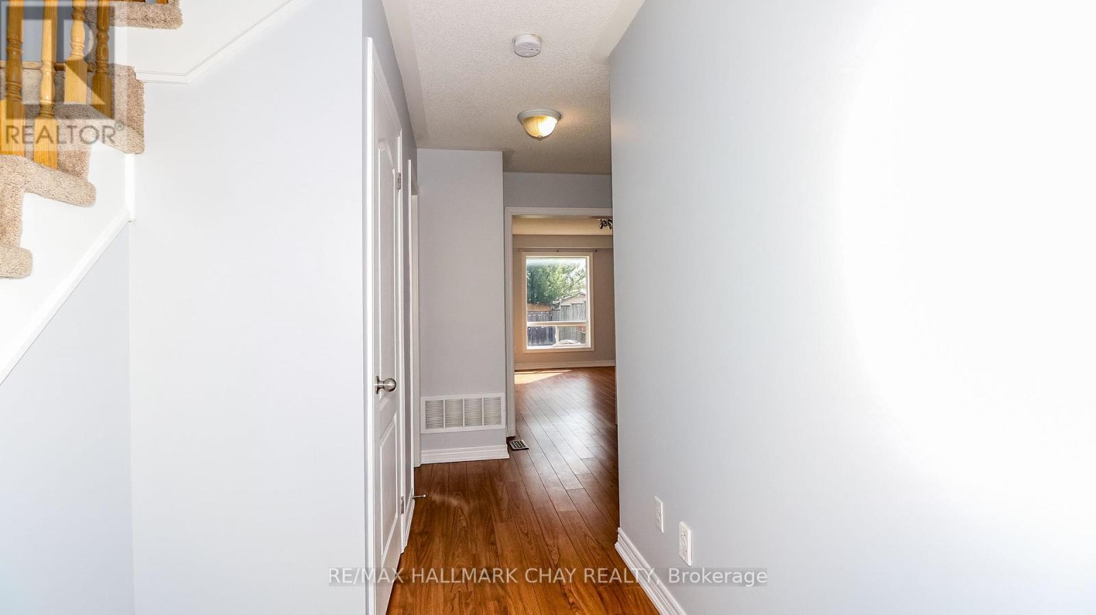 161 Greenwood Drive, Essa, Ontario  L0M 1B4 - Photo 6 - N12148527