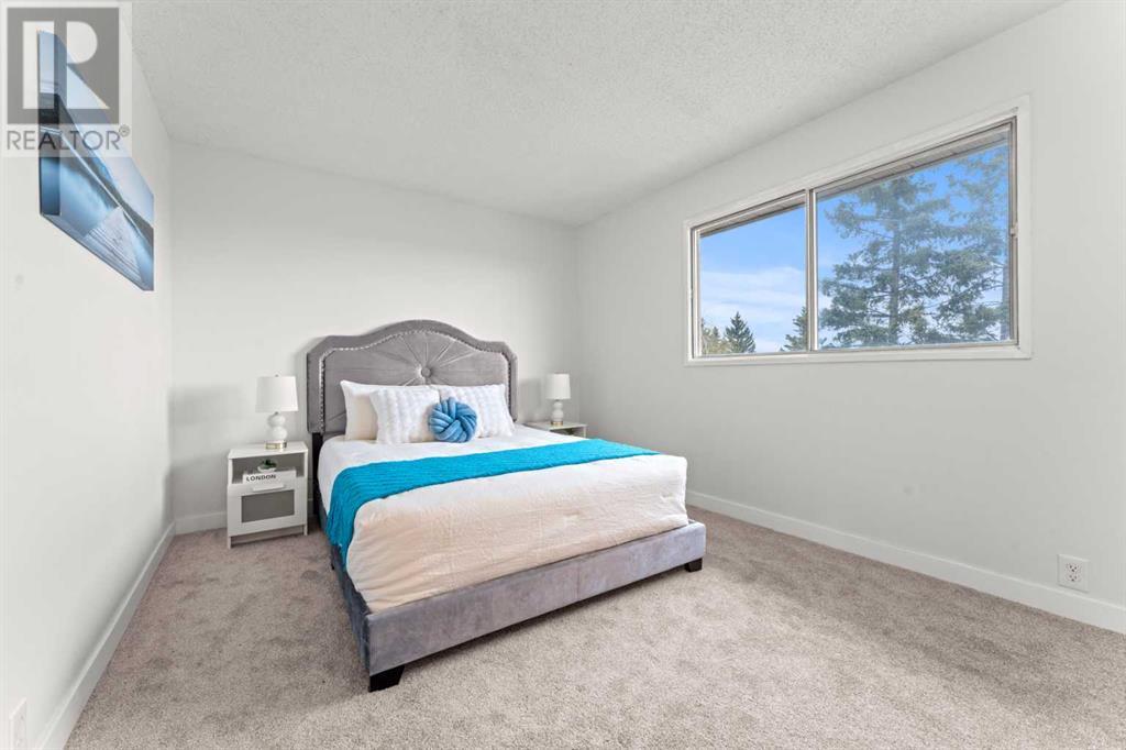 240 Berwick Drive Nw, Calgary, Alberta  T3K 1P5 - Photo 7 - A2220804