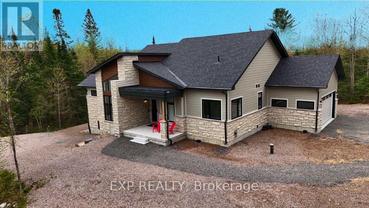 1017 Ridgeline Drive, Lake Of Bays, Ontario  P1J 2J6 - Photo 2 - X12148797