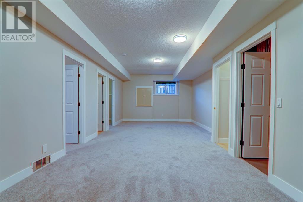 67 Cimarron Drive, Okotoks, Alberta  T1S 1S6 - Photo 22 - A2218564