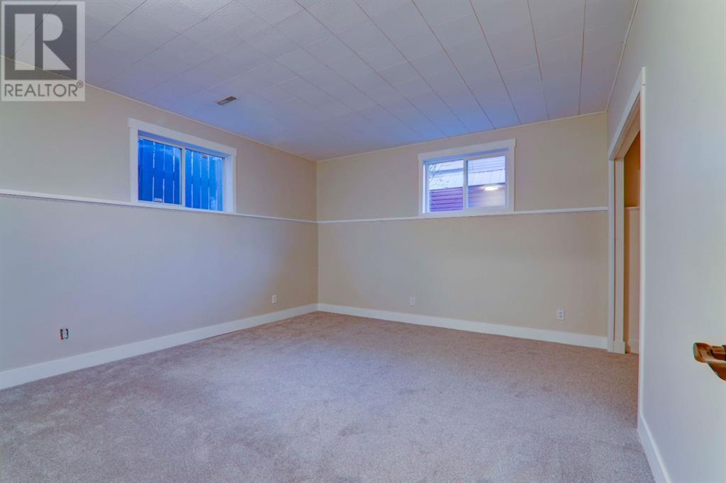 67 Cimarron Drive, Okotoks, Alberta  T1S 1S6 - Photo 24 - A2218564
