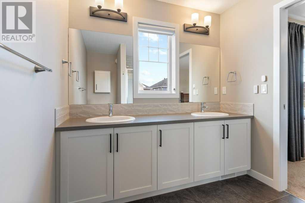 2005 Ravensdun Crescent Se, Airdrie, Alberta  T4A 3K2 - Photo 26 - A2219378
