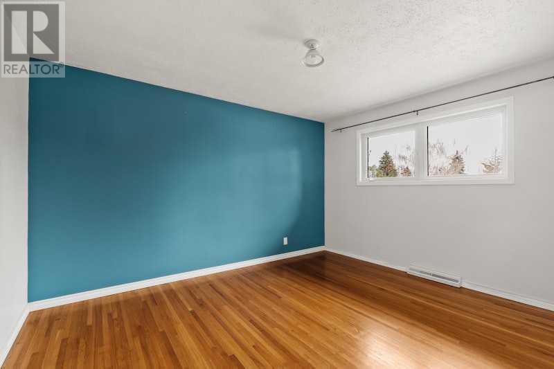 58 Grafton Crescent Sw, Calgary, Alberta  T3E 4X1 - Photo 12 - A2211025