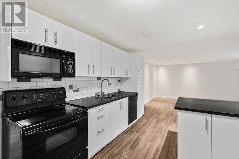 58 Grafton Crescent Sw, Calgary, Alberta  T3E 4X1 - Photo 19 - A2211025