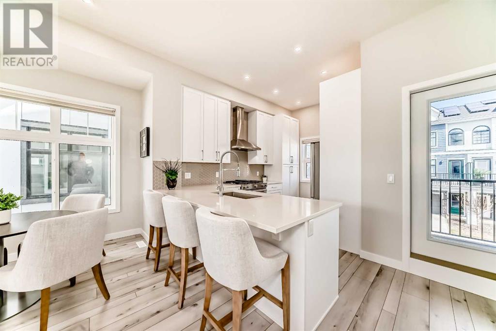Property at 228 Les Jardins Park SE image 4