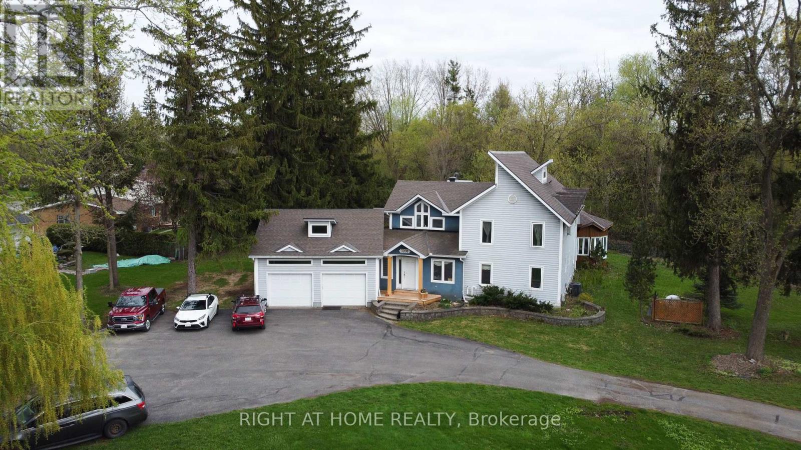 One-of-a-Kind Massive Lot! Are you looking for a property in Ottawa where you can park all your equipment? Do you work from home and need extra space for vehicles, tools, or storage? Possibly build one maybe 2 more homes on the property? Look no further this is the one! According to GeoWarehouse, the authoritative web-based property information platform, this property spans 1.55 acres (67,705 sq. ft.). The home is approximately 3,000 sq. ft. and includes a 2-CAR ATTACHED GARAGE Plus AN ADDITIONAL 2-CAR DETACHED GARAGE, expensive to build! Perfect for all your extra storage and workspace needs. Enjoy a beautifully landscaped yard with mature trees backing onto a creek, a large rear deck, which holds an attached solarium and gazebo. An ideal spot to enjoy your morning coffee. Inside, this uniquely designed home features a massive kitchen, open to a large dining room/family room which leads out to the solarium/gazebo. Additionally, a spacious living room with a wood-burning fireplace! There's also a huge main-floor office or kids playroom. Upstairs, you will find three large bedrooms plus an additional fourth bedroom that could be used as an office. High windows and ceilings bring a spectacular flair. The primary bedroom includes a large ensuite bathroom with double sinks. While the home could use some TLC, it's overall move-in ready with incredible potential.  Short Walk to Bayshore Shopping Centre, and LRT Station. Minutes away from Parks, Sport Fields, Tennis Courts, Rinks and a 4-minute drive to Queensway Carleton Hospital. High scores from Hood Q:  Schools 8.8, Transit 8.5, Safety 8.5, and Parks 9.3. This property also offers huge development potential! See City of Ottawa New Bylaw Zoning Amendment. (id:48254)