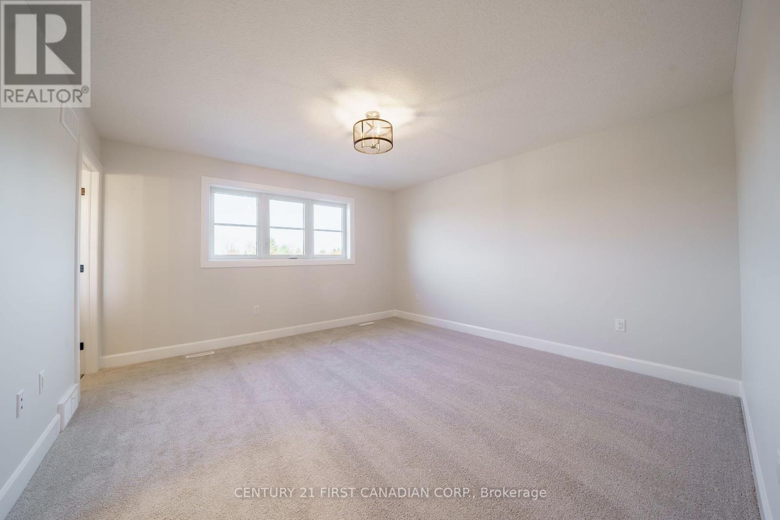27 Postma Crescent, North Middlesex, Ontario  N0M 1A0 - Photo 16 - X12149846