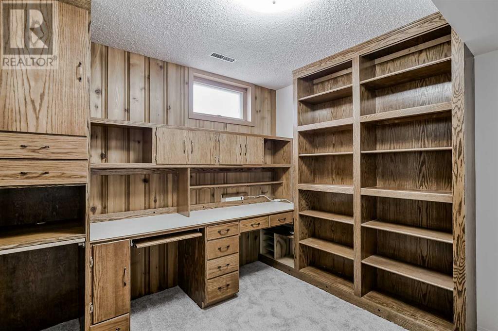 6737 Livingstone Drive Sw, Calgary, Alberta  T3E 6J2 - Photo 35 - A2220536