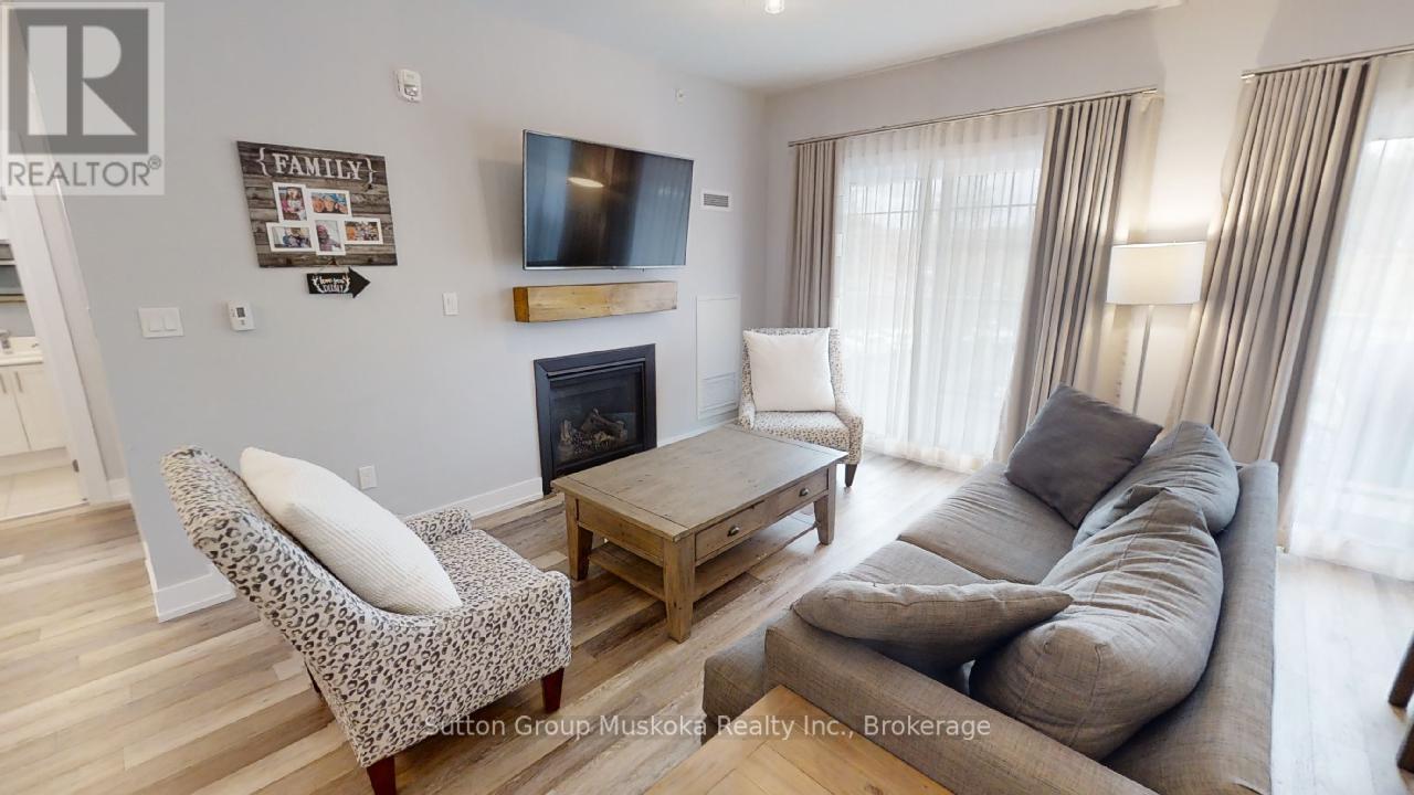 318 - 25 Pen Lake Point Road, Huntsville, Ontario  P1H 2E8 - Photo 2 - X12149947