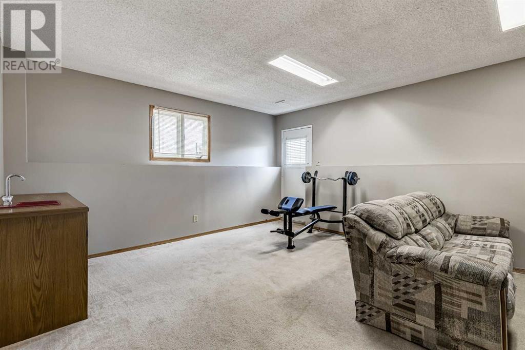 31 Woodmont Way Sw, Calgary, Alberta  T2W 4L7 - Photo 24 - A2220193