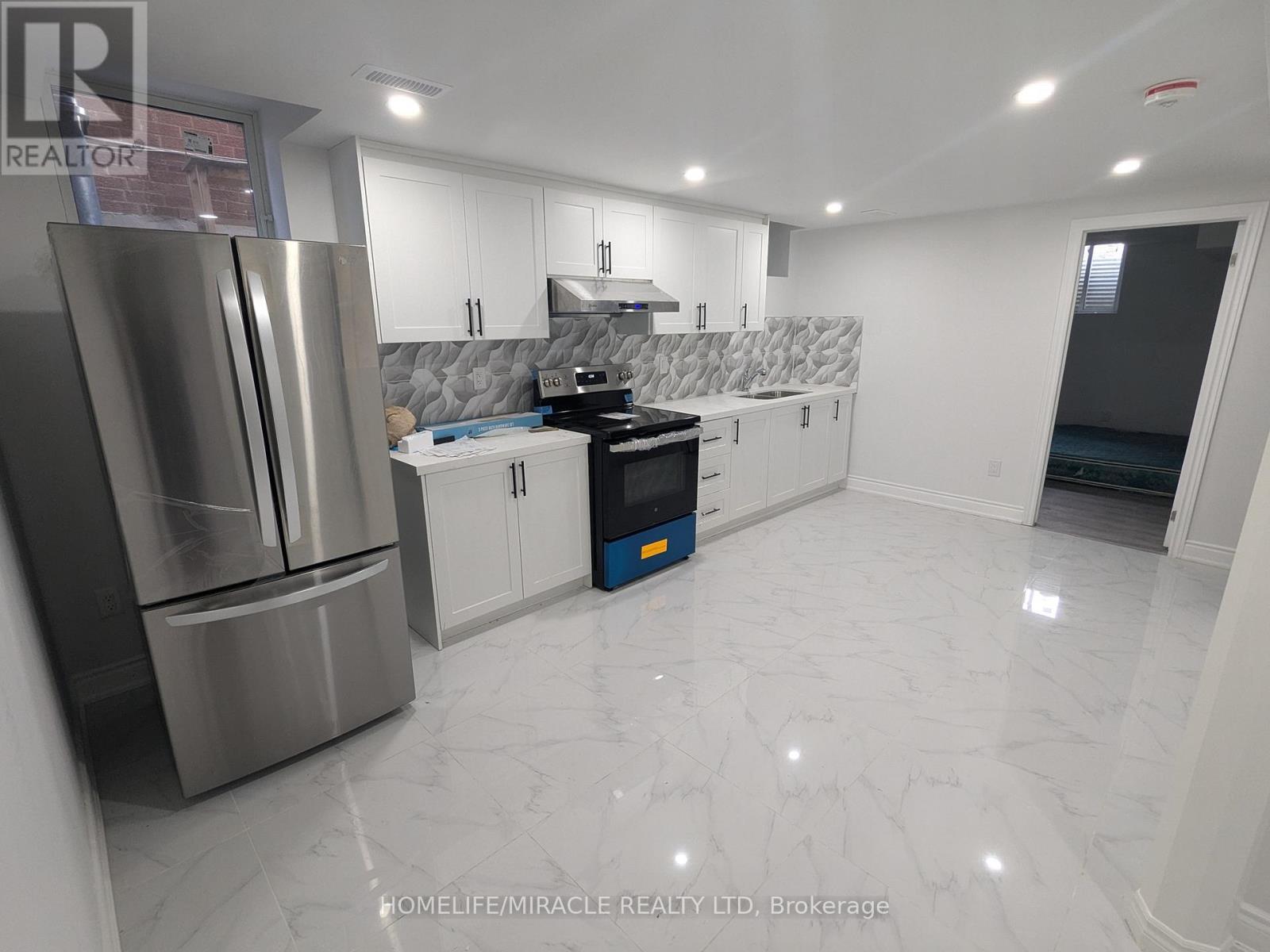 103 Hullrick Drive, Toronto (Rexdale-Kipling), Ontario  M9W 6W4 - Photo 1 - W12150240