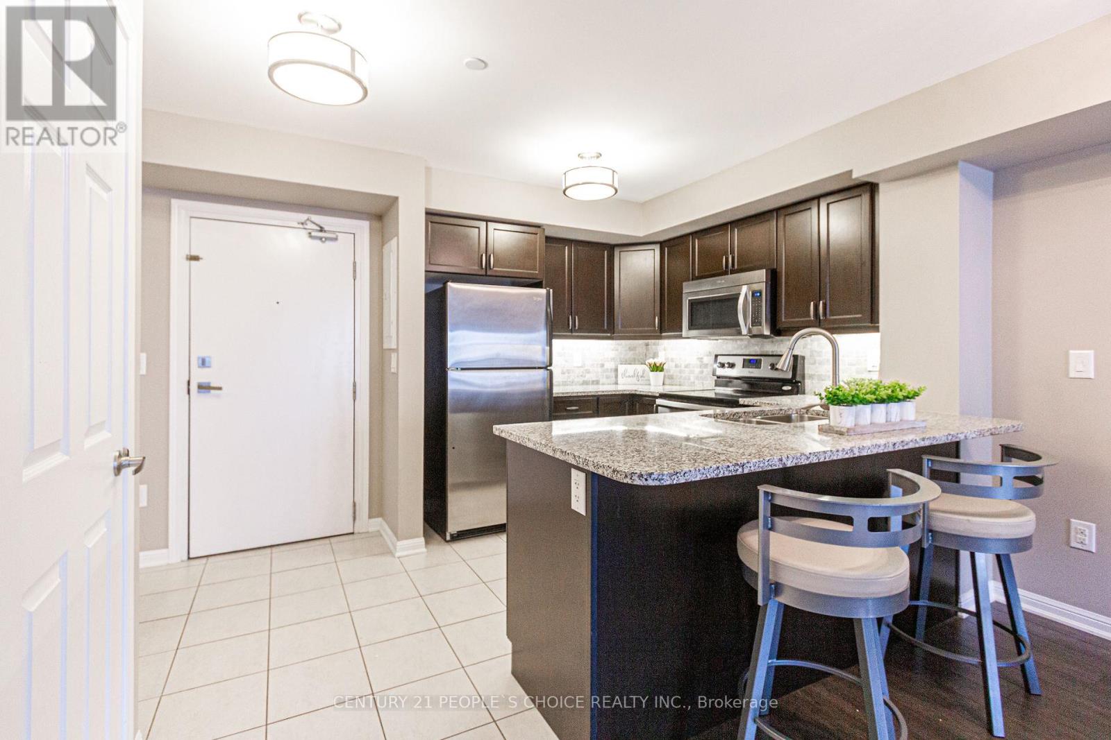 211 - 1045 Nadalin Heights, Milton, Ontario  L9T 8R5 - Photo 6 - W12150838
