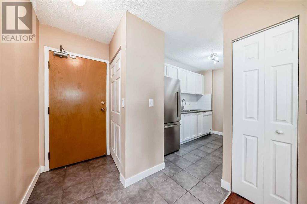 202, 4944 Dalton Drive Nw, Calgary, Alberta  T3A 2E6 - Photo 3 - A2216859